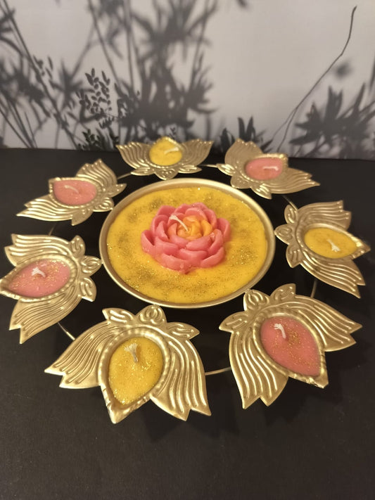 Pink and yellow lotus-shaped candle